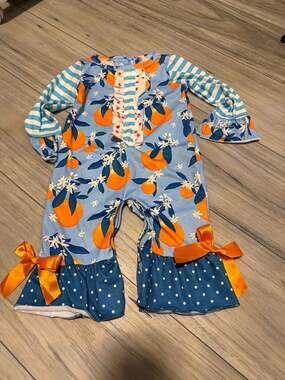Little Millie Orange Floral and Polka Dot Ruffle Romper